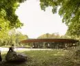 Historic mansion in Panevezys - a glazed structure with a semicircular plan has been partially sunk into the ground