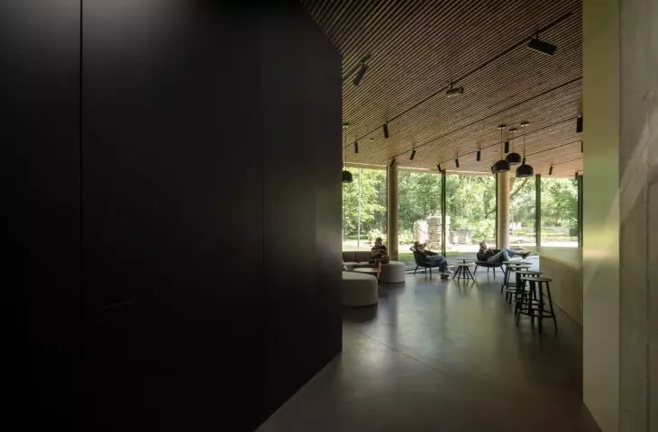 The historic mansion in Panevezys - the interiors of the building are distinguished by the use of durable, natural materials such as concrete floors and walls, wooden ceilings and monochromatic furniture