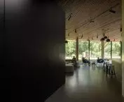 The historic mansion in Panevezys - the interiors of the building are distinguished by the use of durable, natural materials such as concrete floors and walls, wooden ceilings and monochromatic furniture