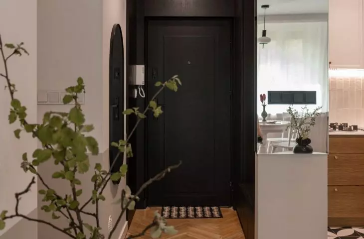 Doors and walls in the entrance area were painted black