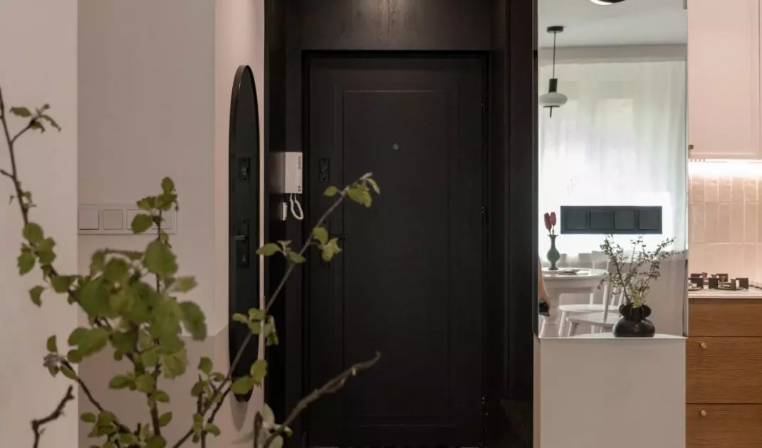 Doors and walls in the entrance area were painted black