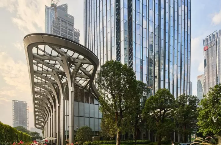 Star River Headquarters skyscraper in Guangzhou, China - the first floor of the building has been designed with an overhanging canopy