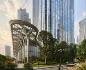 Star River Headquarters skyscraper in Guangzhou, China - the first floor of the building has been designed with an overhanging canopy
