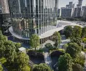 The Star River Headquarters skyscraper in Guangzhou, China - within the square, a staircase has been designed to lead through a specially designed lowering of the ground, allowing access to underground retail spaces