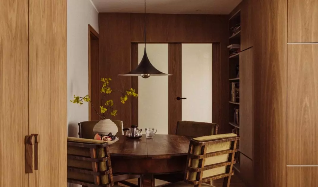 The living room connects to the dining room