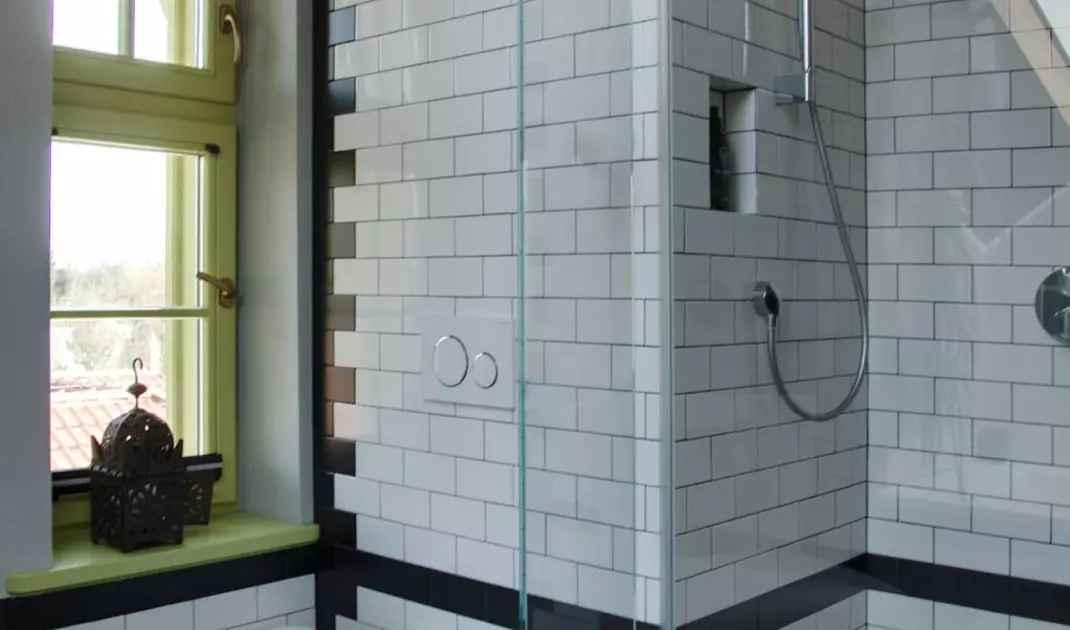 Black and white metro-style tiles were juxtaposed with patterned tiles