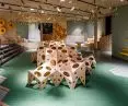 The archipelago is formed by sloping plywood elements finished in semi-matte varnish