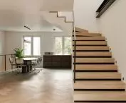 Conversion of a 1970s semi-detached house.
