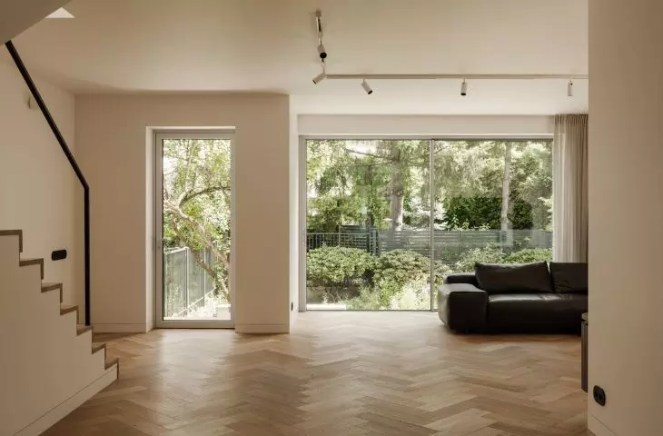 Conversion of a 1970s semi-detached house.