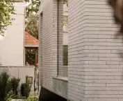 Conversion of a 1970s semi-detached house.