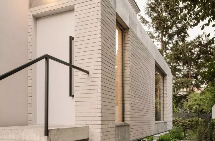 Conversion of a 1970s semi-detached house.