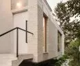 Conversion of a 1970s semi-detached house.
