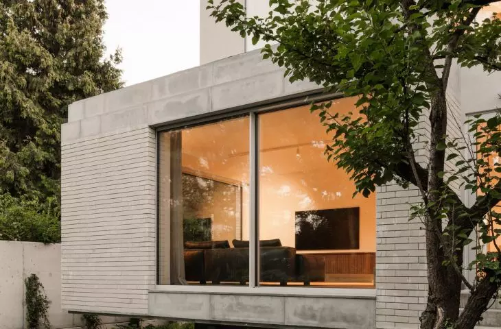 Conversion of a 1970s semi-detached house.