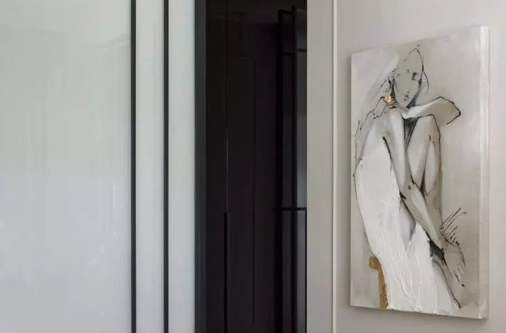 The painting was framed in a stucco 