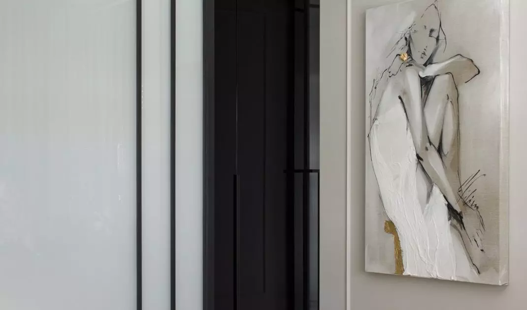 The painting was framed in a stucco 