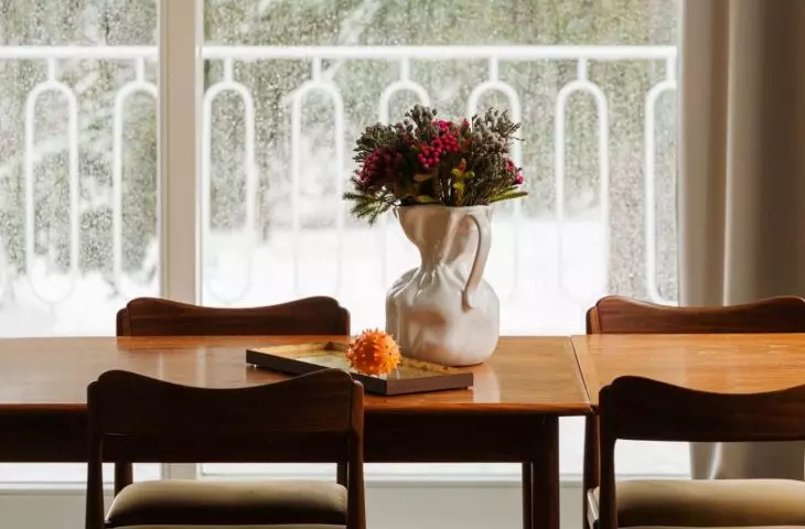 The arrangement combines modern furnishings with historical elements