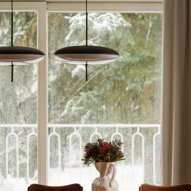 The arrangement combines modern furnishings with historical elements