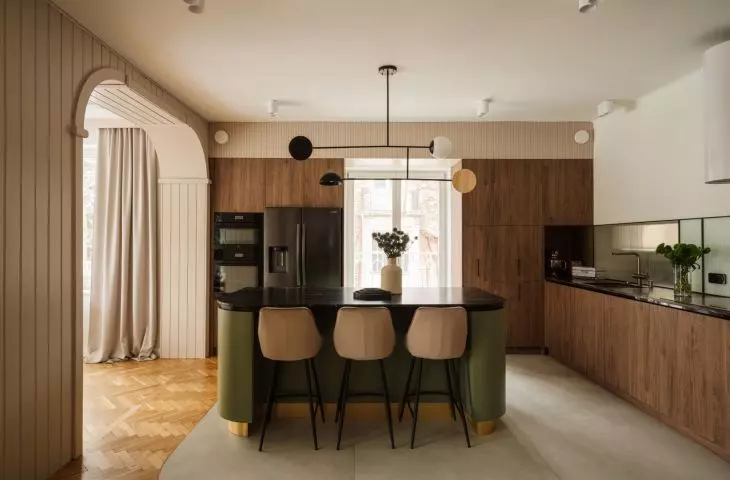 The kitchen was moved from a separate room to the living area