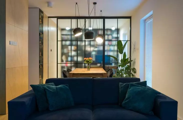 The heart of the living room is the navy blue couch