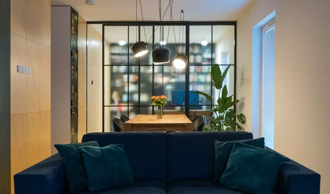 The heart of the living room is the navy blue couch