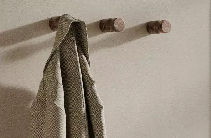 Marble coat hooks will add variety to the hallway