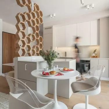 Hexagonal wall separates workspace from kitchen