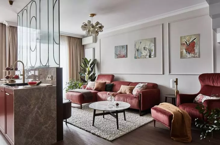 The living area is divided into living room, kitchen and dining room  