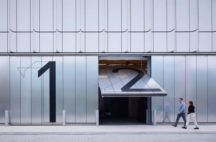 The John A. Volpe National Center for Transportation Systems. Volpe's six garage doors connect laboratories to urban space, allowing demonstrations to take place