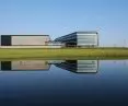 Mascot International's new headquarters and logistics center in Pårup, Denmark - one of the elevations looks as if the block is divided into two separate parts