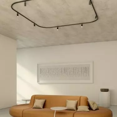 Black rounded rail will be an interesting decoration of a minimalist interior