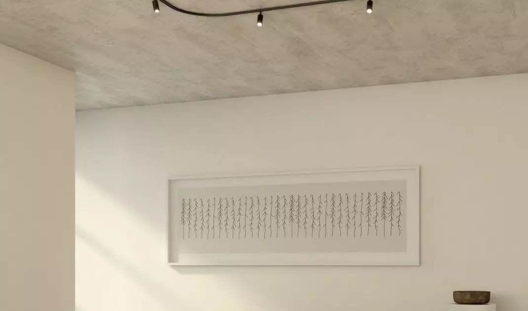 Czarny zaokrąglony szynoprzewód będzie ciekawą dekoracją minimalistycznego wnętrza 
