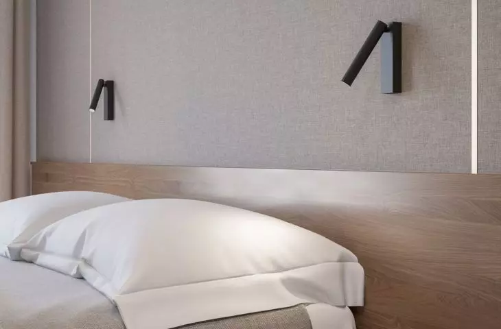 Practical wall lamp provides comfort during evening reading