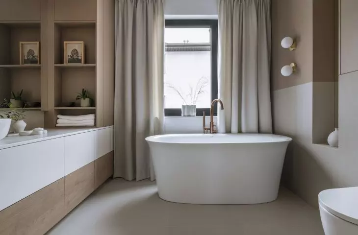 Bathroom arrangement is consistent with the rest of the decor
