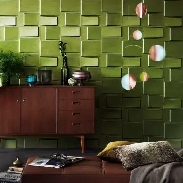 Paint the wall with metallic paint to get a shiny effect