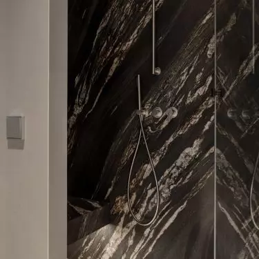 Light furniture softens dark stone