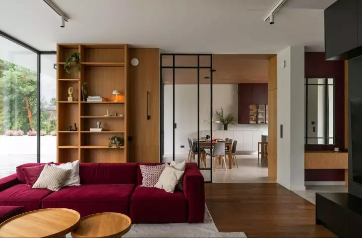 Interior with sofa in magenta shade