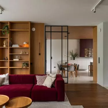 Interior with sofa in magenta shade