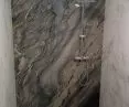 Quartz sinter bathroom with Brazilian quartzite shower tile