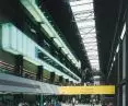 The Tate Modern Gallery in London - the Turbine Hall is a three-story-high space whose austere industrial finish harmonizes with modernist interventions