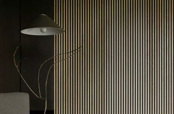 The corrugated panel was made of stained raw MDF