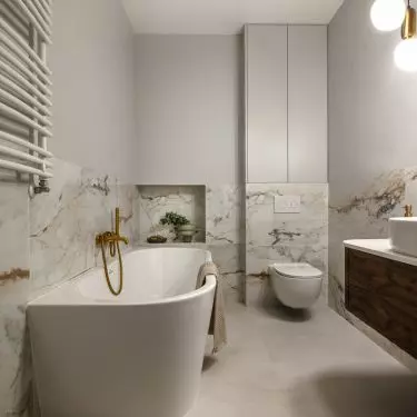 The highlight of this bathroom is a comfortable bathtub