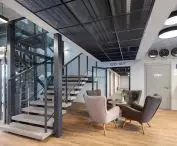 At Lithuania's Air Hotel, the designers decided to decorate the lobby and staircase with black openwork panels from the Mesh Met line.