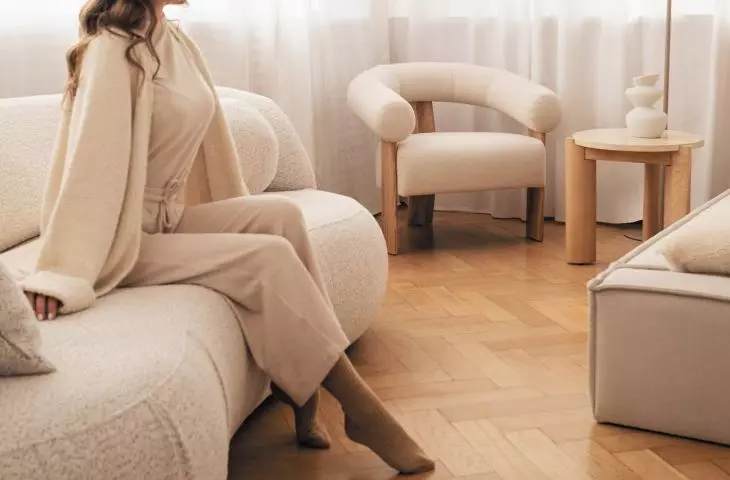 Kokei, Medley lounge chair, side table, travertine/ashmere