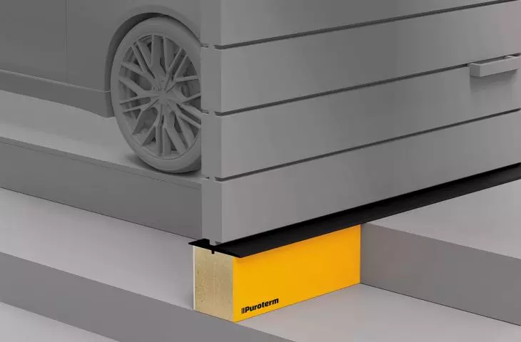 Puroterm HEAVY with GR seal installed under a sectional garage door. Paired with the gasket of the lower section of the door, it creates an extremely effective seal while eliminating the linear thermal bridge