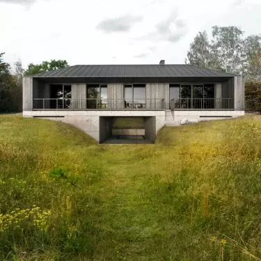 The plot is surrounded by forest