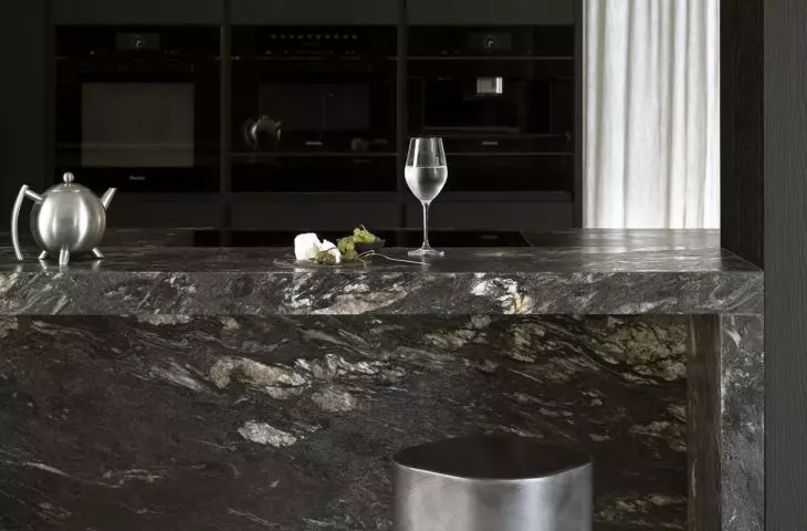 The kitchen is kept in shades of black