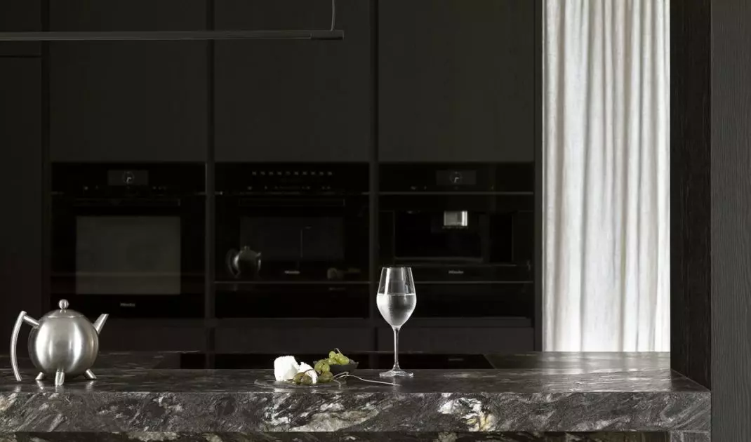 The kitchen is kept in shades of black