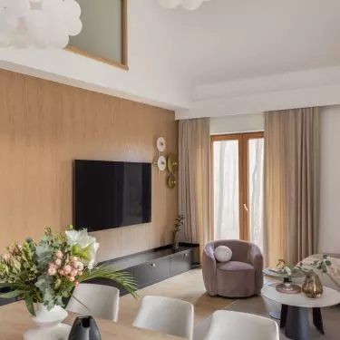 The wall with the TV was finished with wood