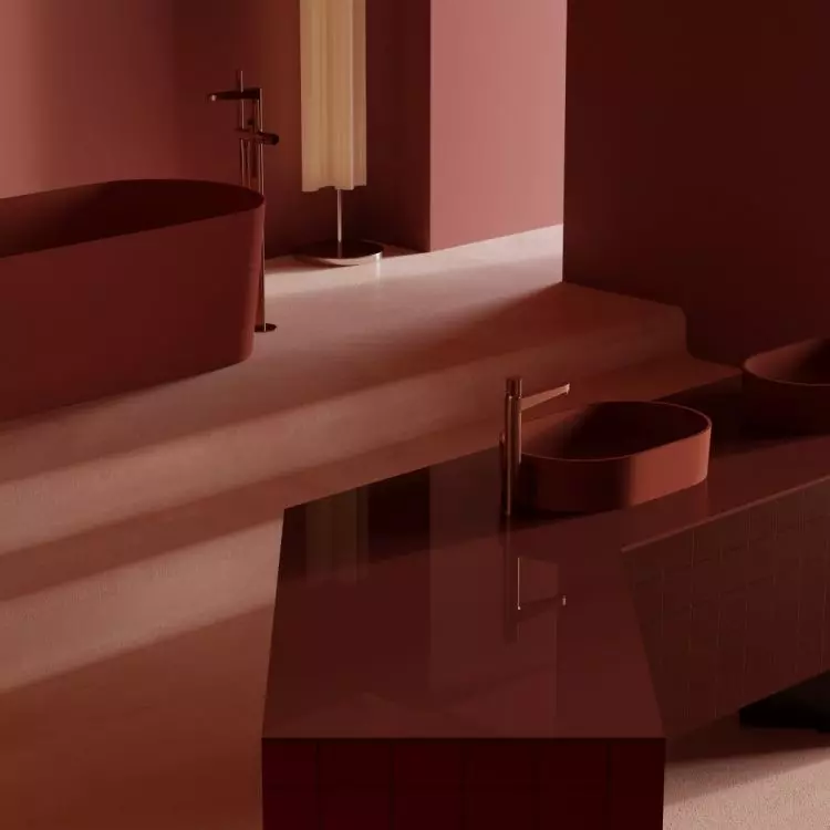 The juxtaposition of glossy and matte surfaces adds depth to a monochromatic arrangement