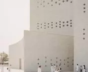 Auditorium at the Jain monastery of Shrimad Rajchandra Ashram in Dharampur, Gujarat - small circular holes, resembling perforations, allow natural light to flow into the interior